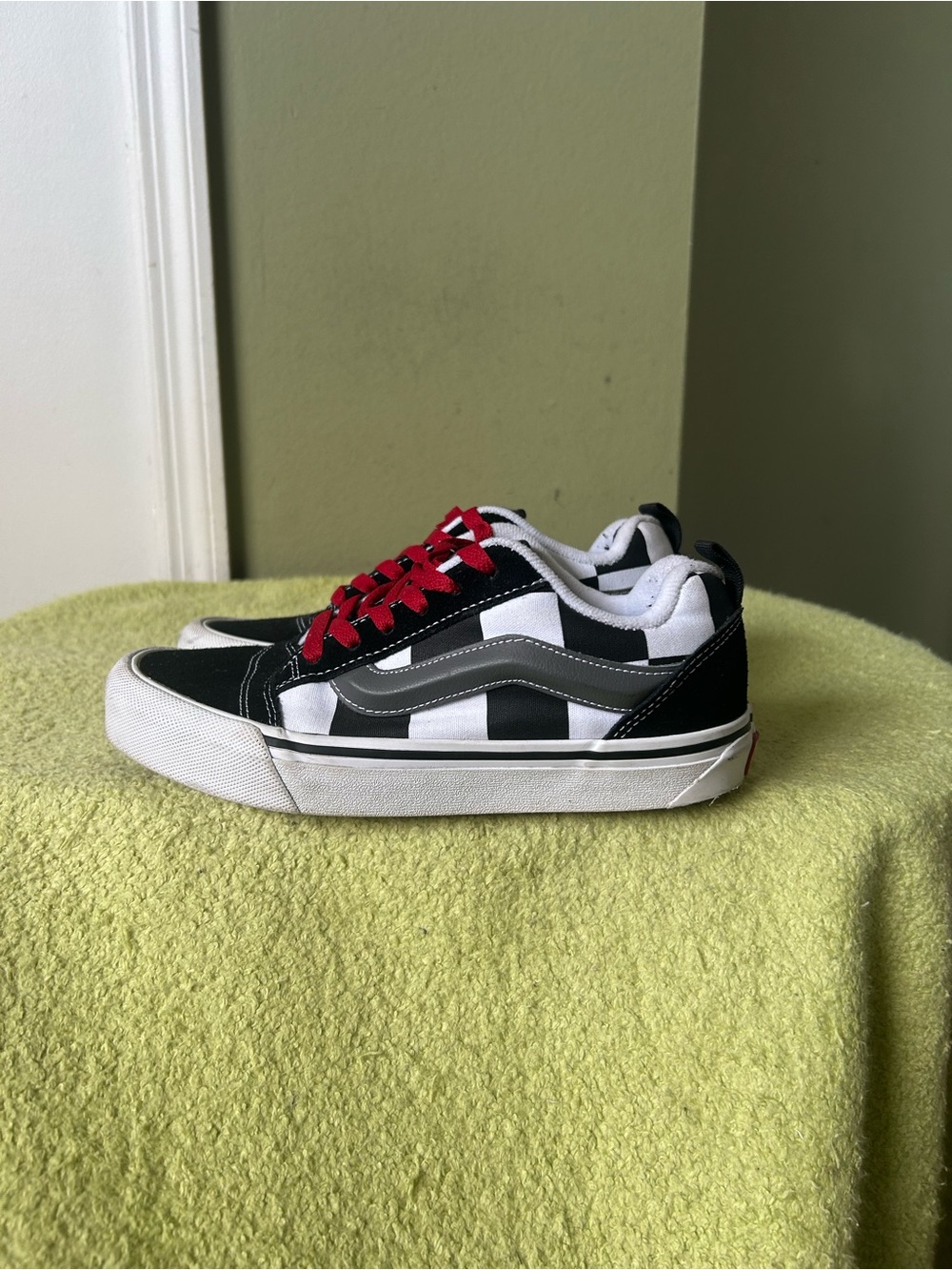 Vans Black & White Checkerboard Sneakers with Red Laces